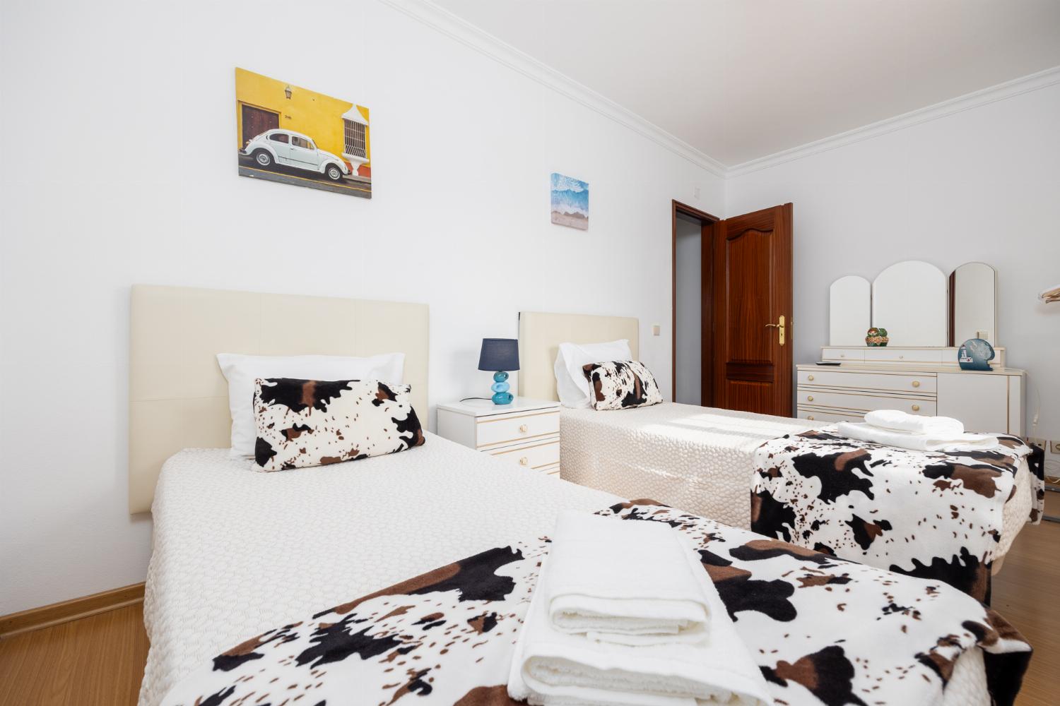 Twin bedroom with A/C