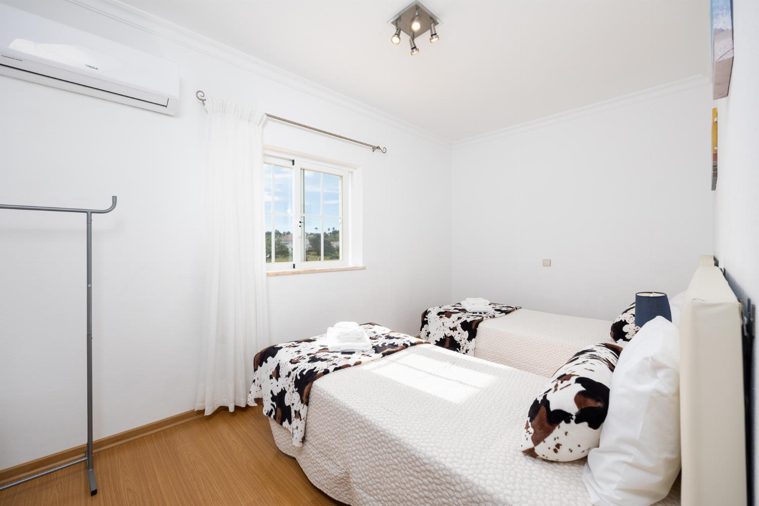 Twin bedroom with A/C
