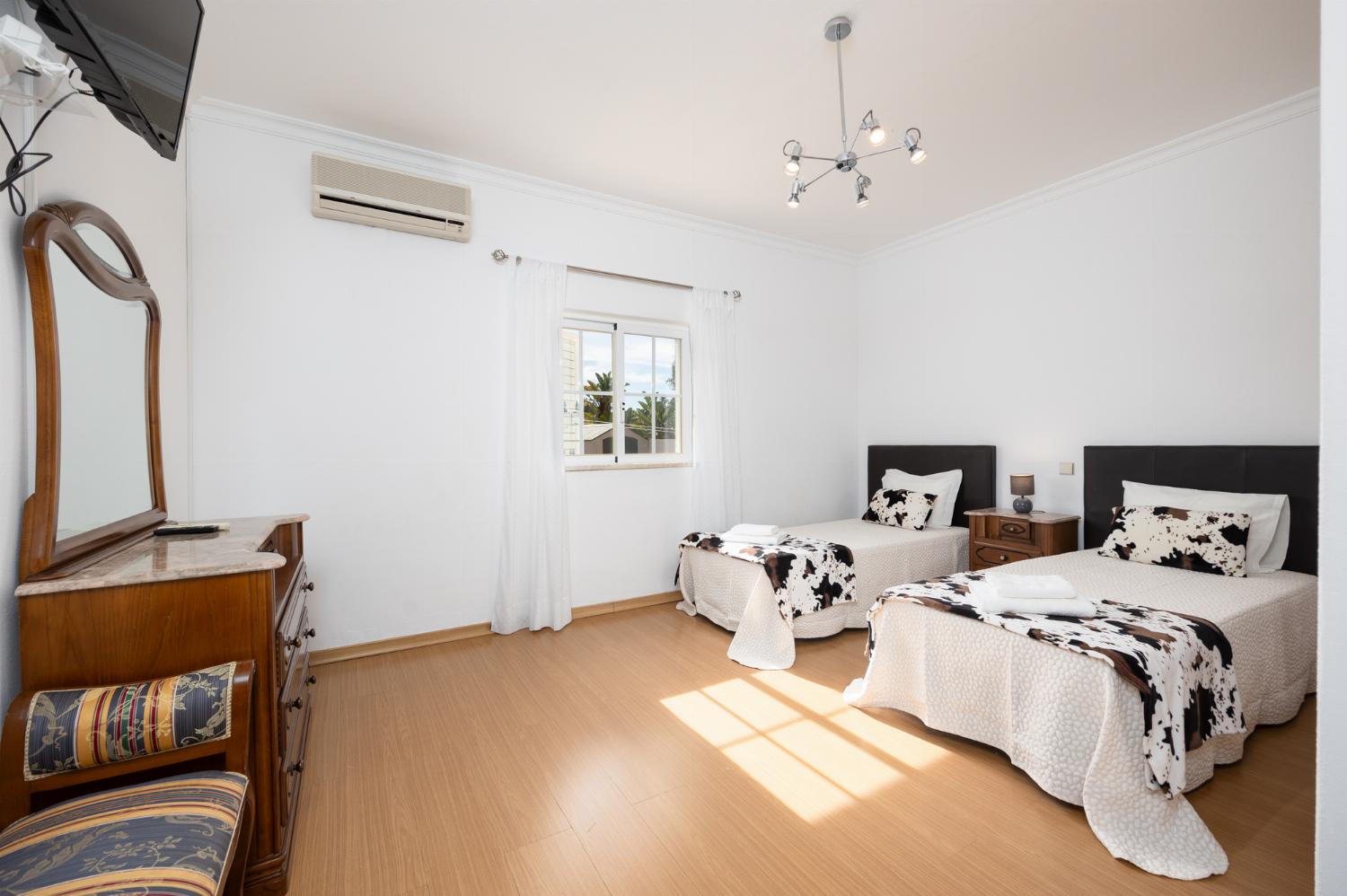 Twin bedroom with A/C