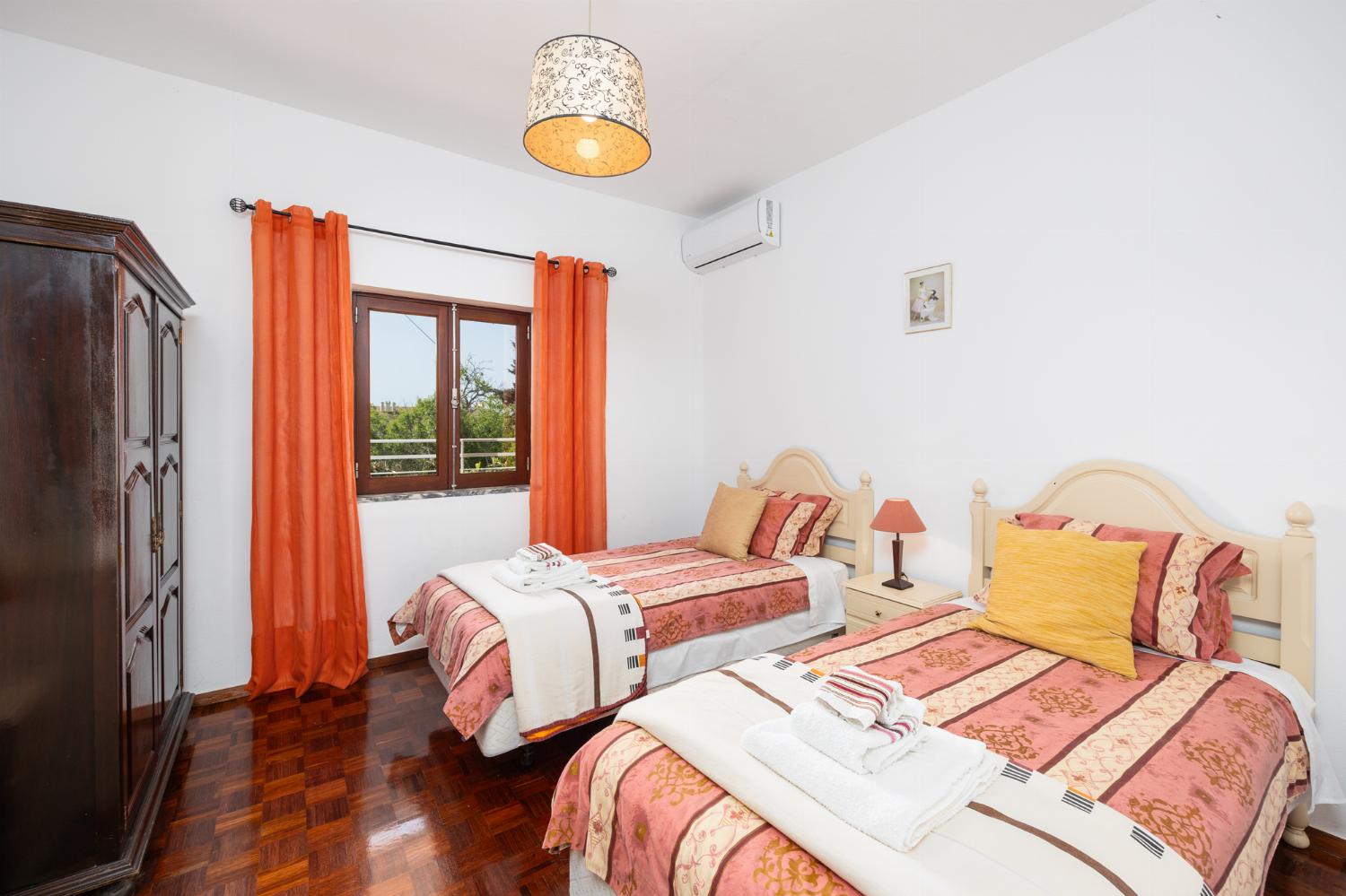 Twin bedroom with A/C