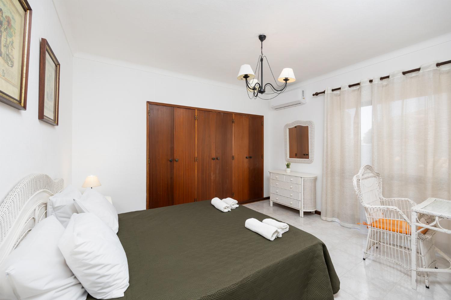 Double bedroom with en suite bathroom and A/C
