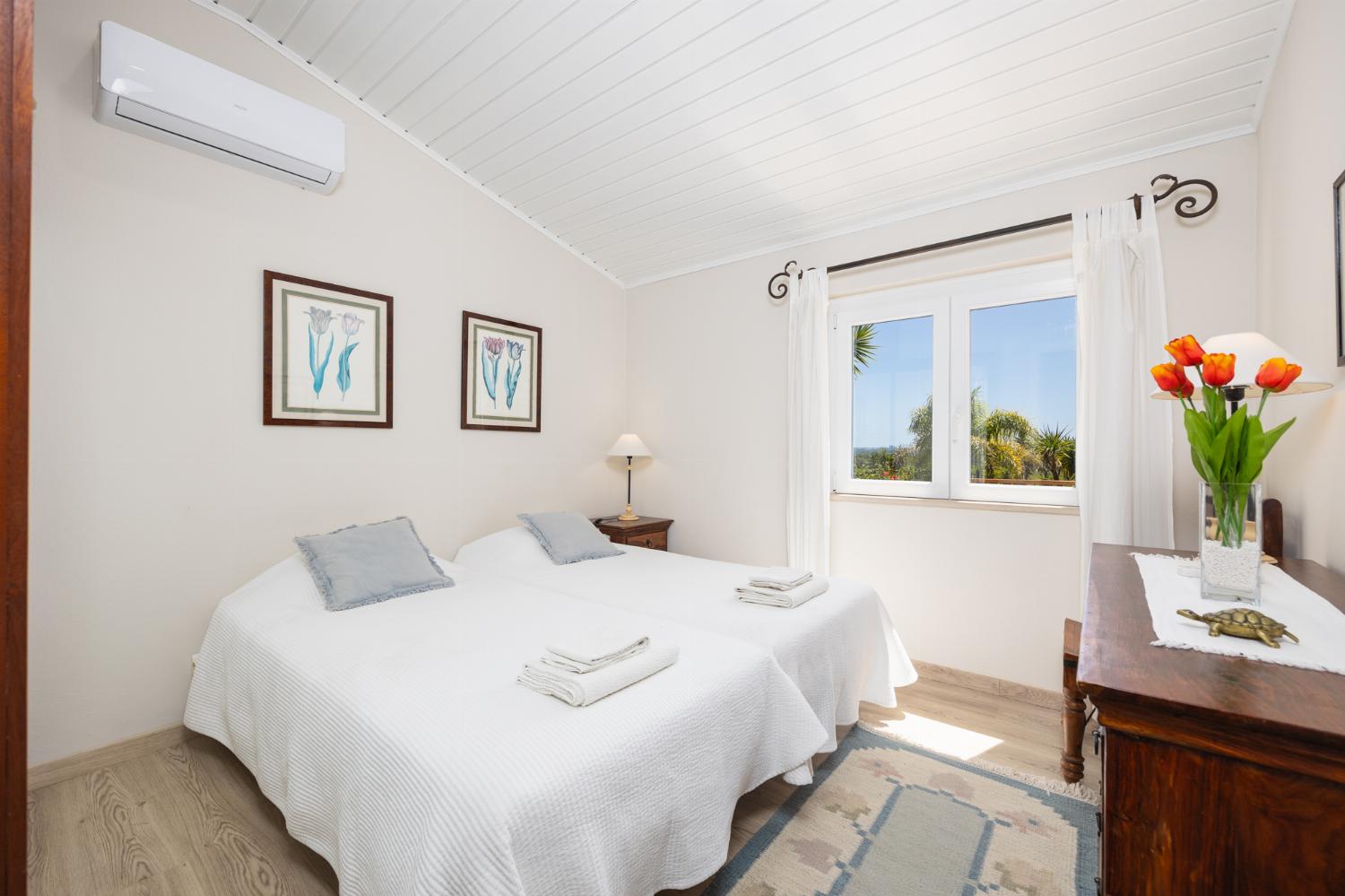 Twin bedroom with A/C