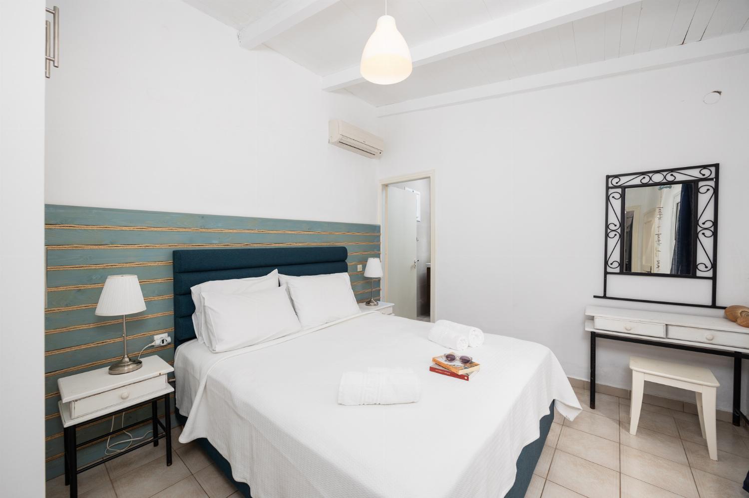 Double bedroom with en suite bathroom and A/C