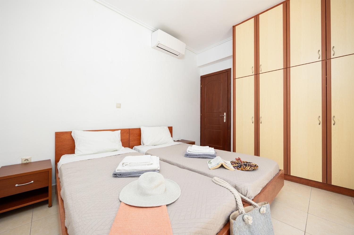 Twin bedroom with A/C