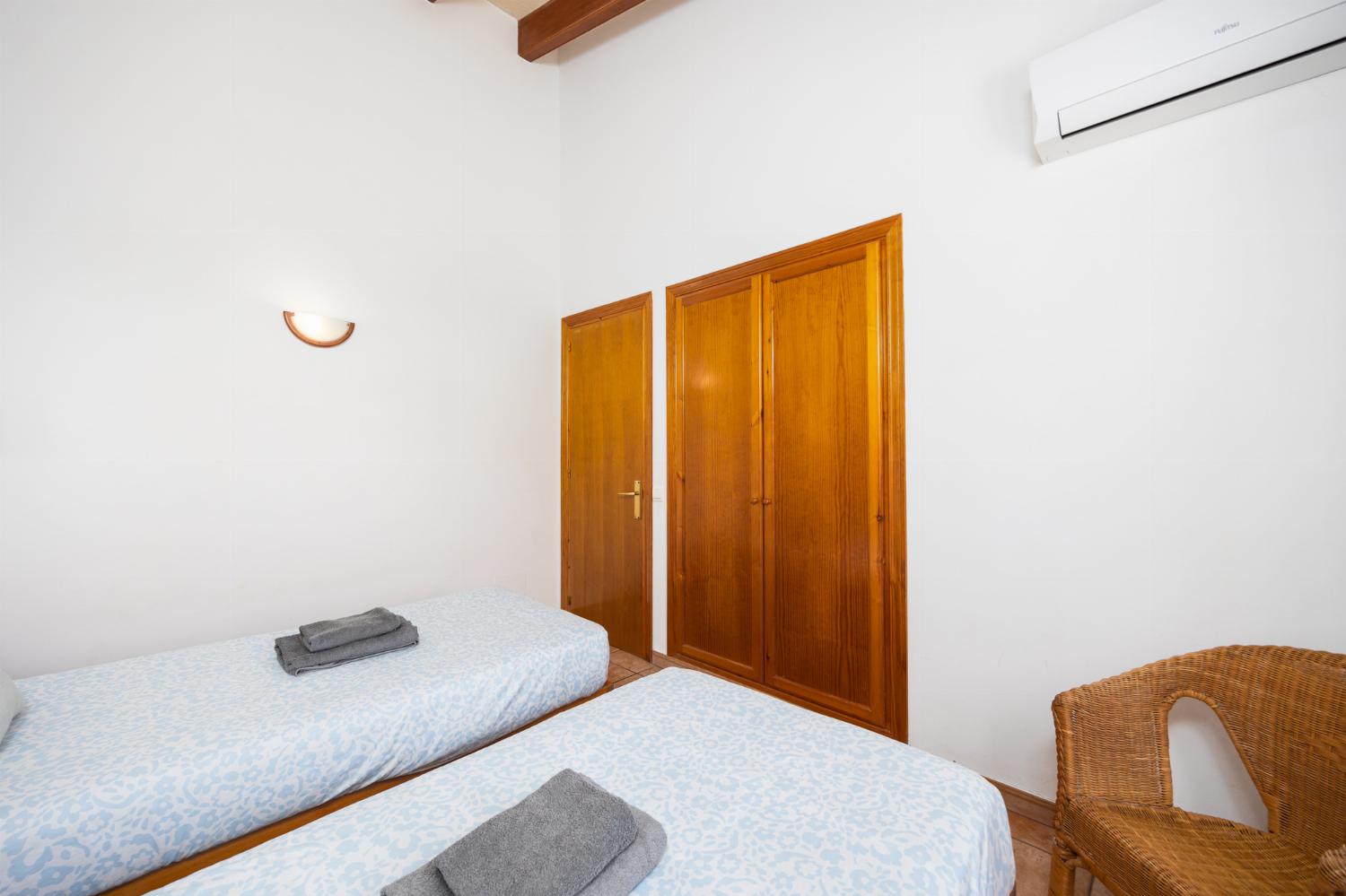Twin bedroom with A/C