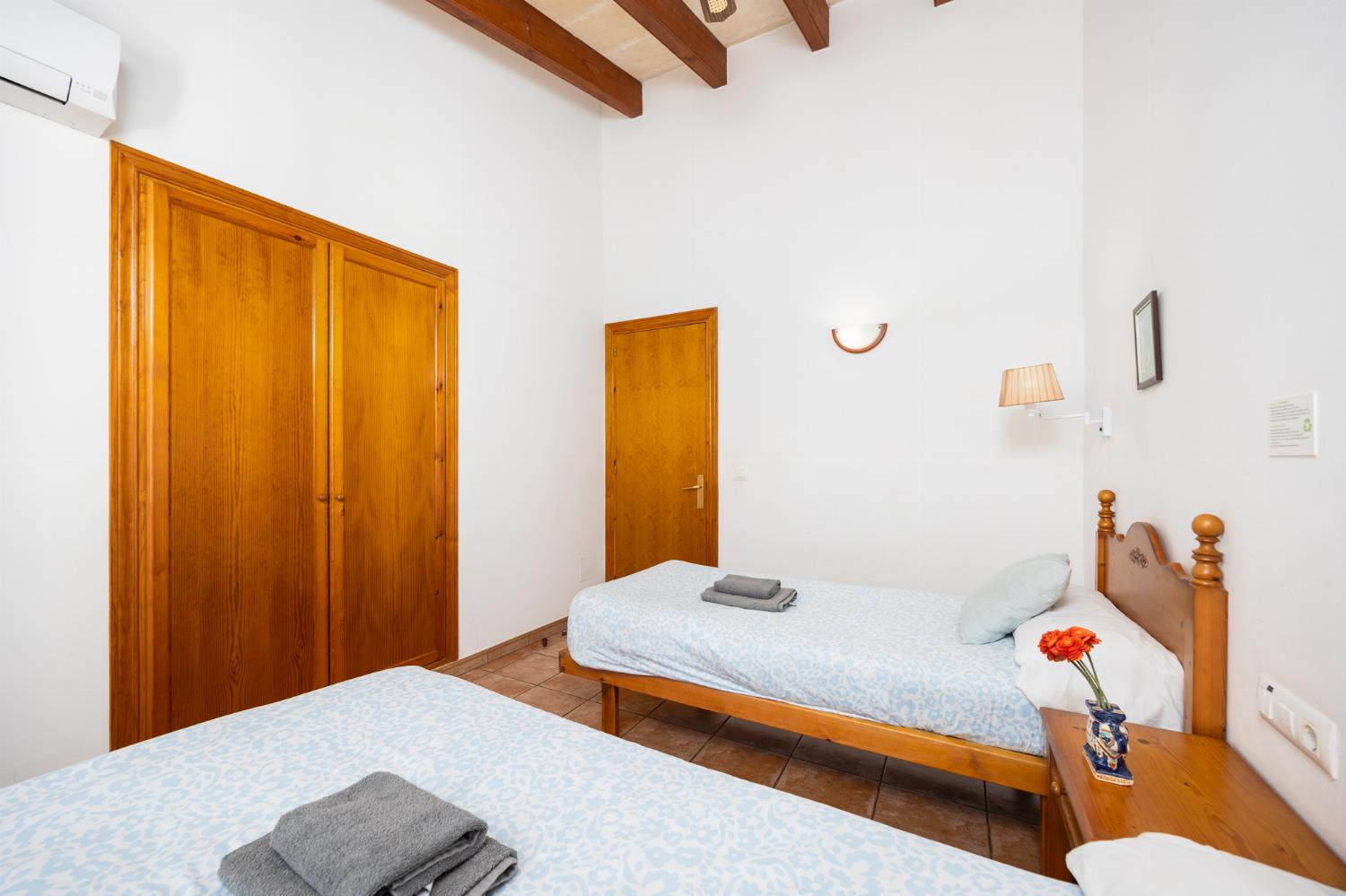 Twin bedroom with A/C