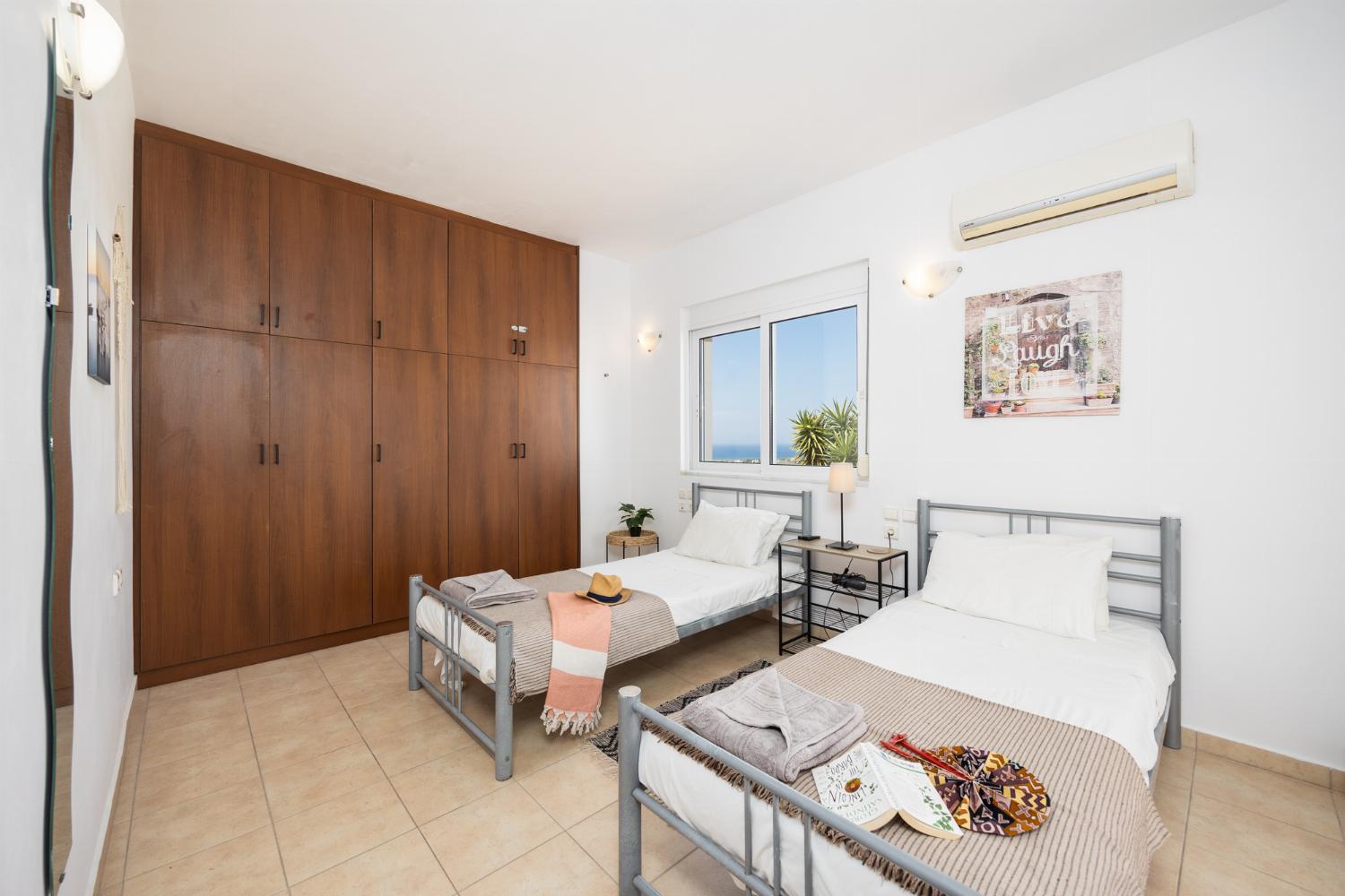 Twin bedroom with A/C