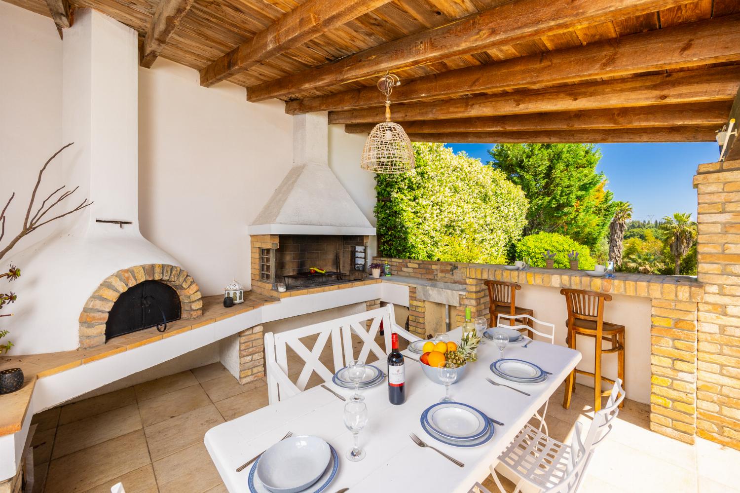 Sheltered terrace area with BBQ