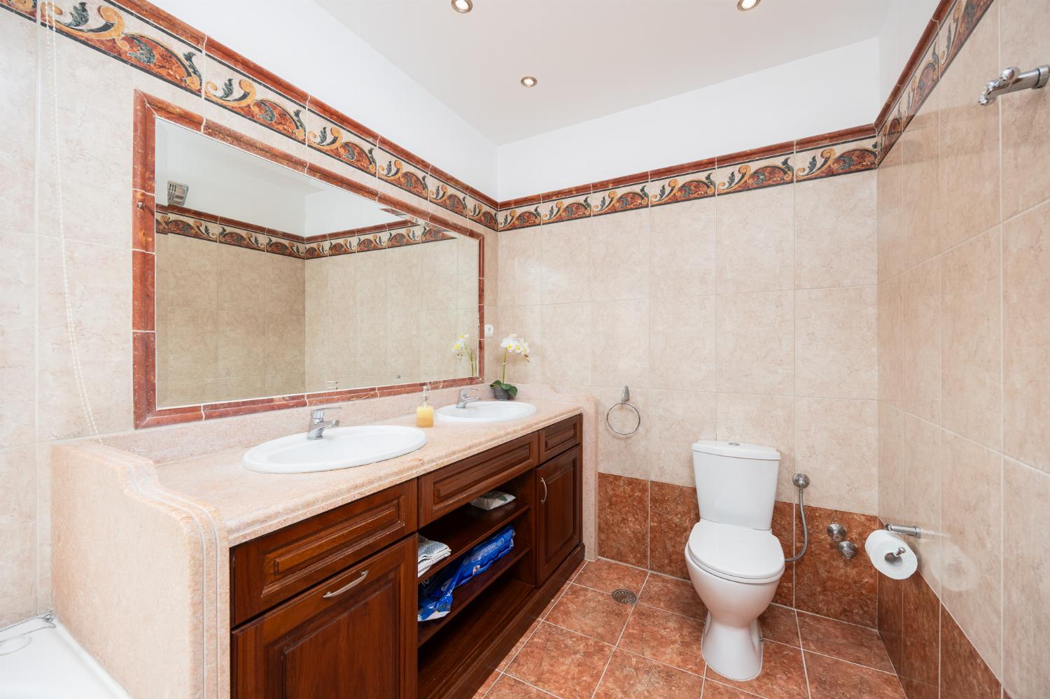 Family bathroom with shower and jacuzzi