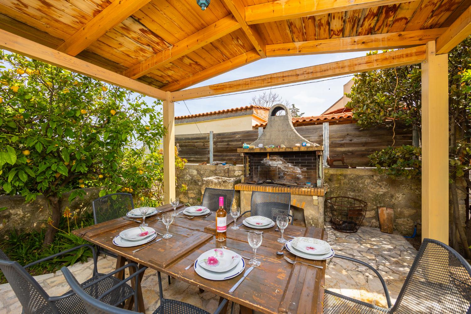 Sheltered terrace area with BBQ