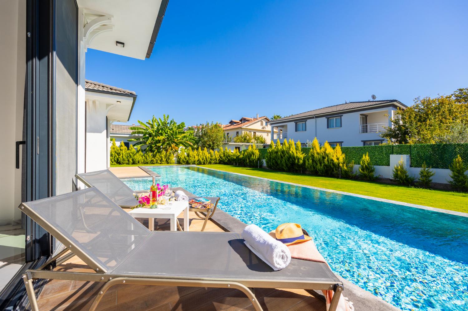 Private pool, terrace, and garden