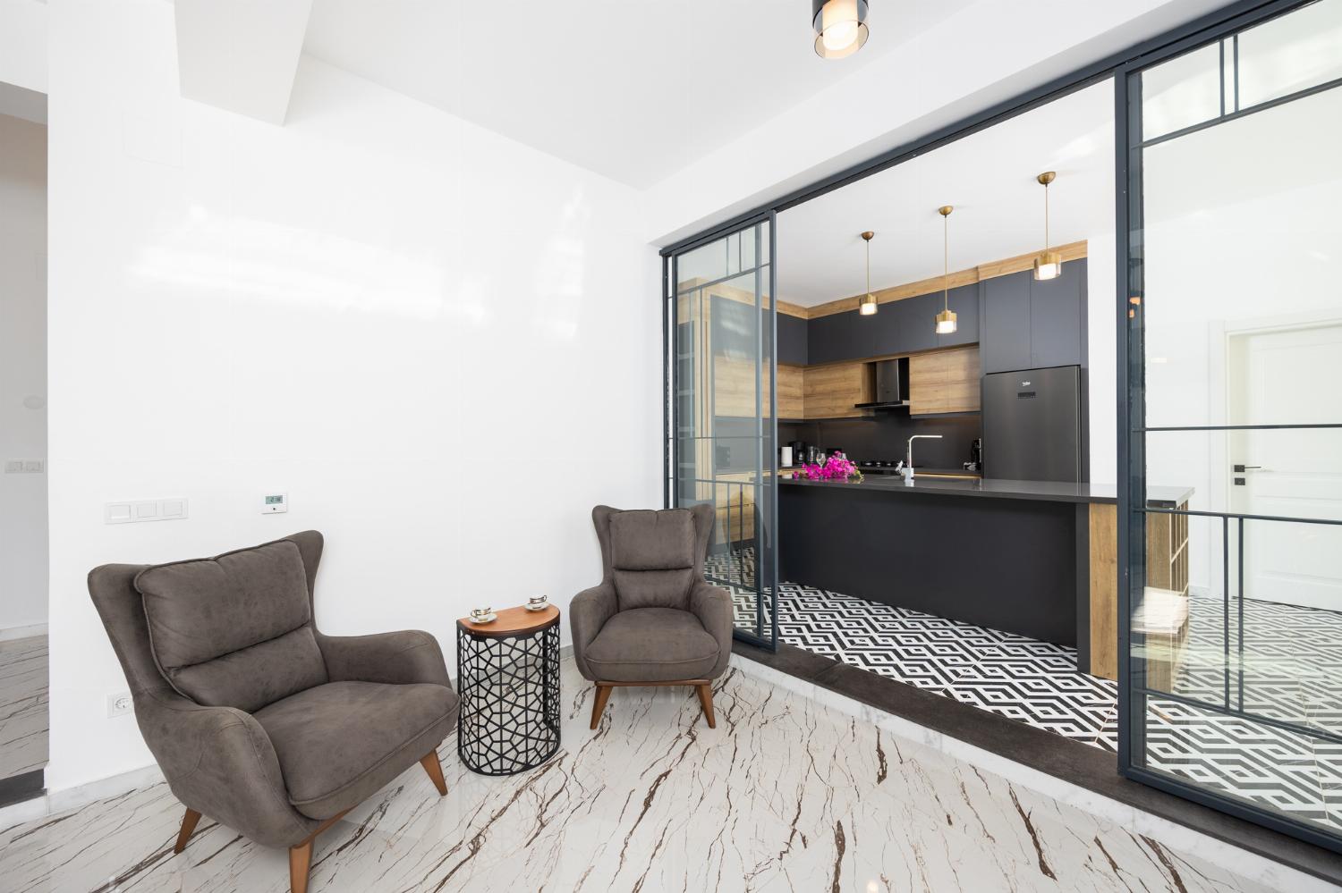 Living room with sofas, A/C, WiFi internet, and satellite TV