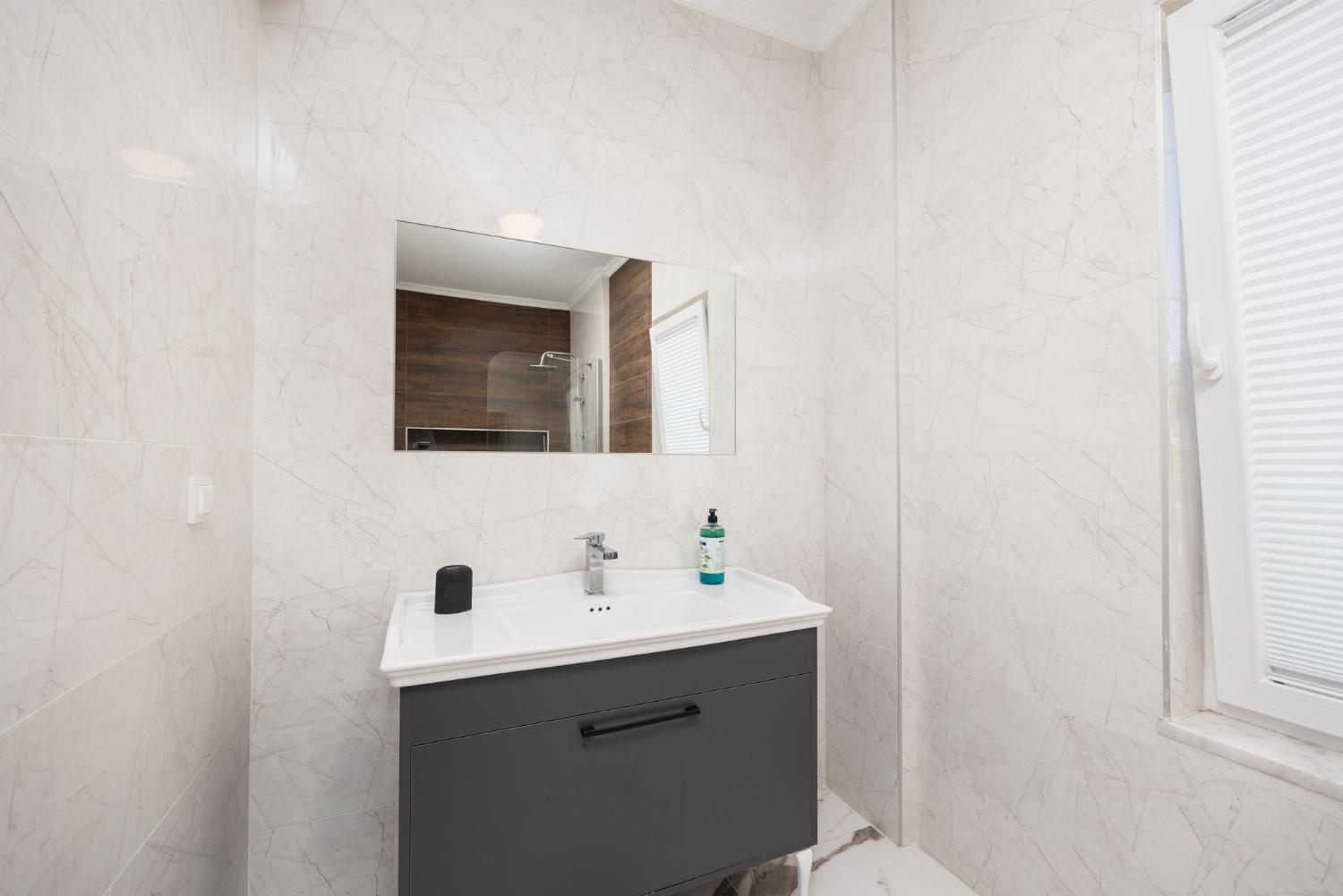 En suite bathroom with shower