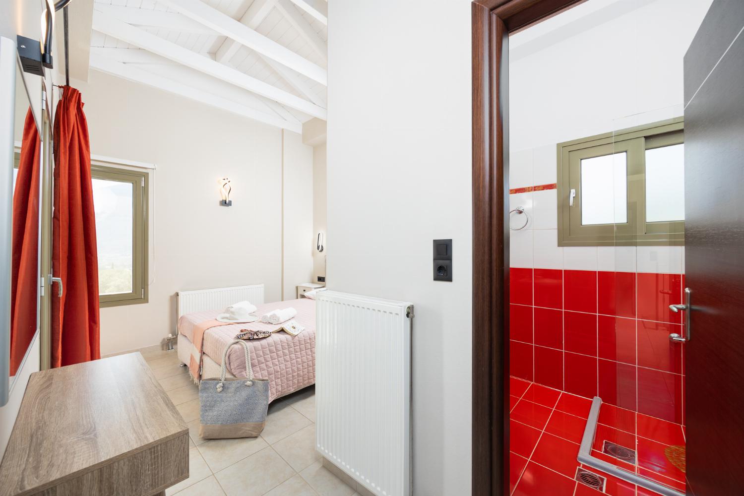 Double bedroom with en suite bathroom and A/C
