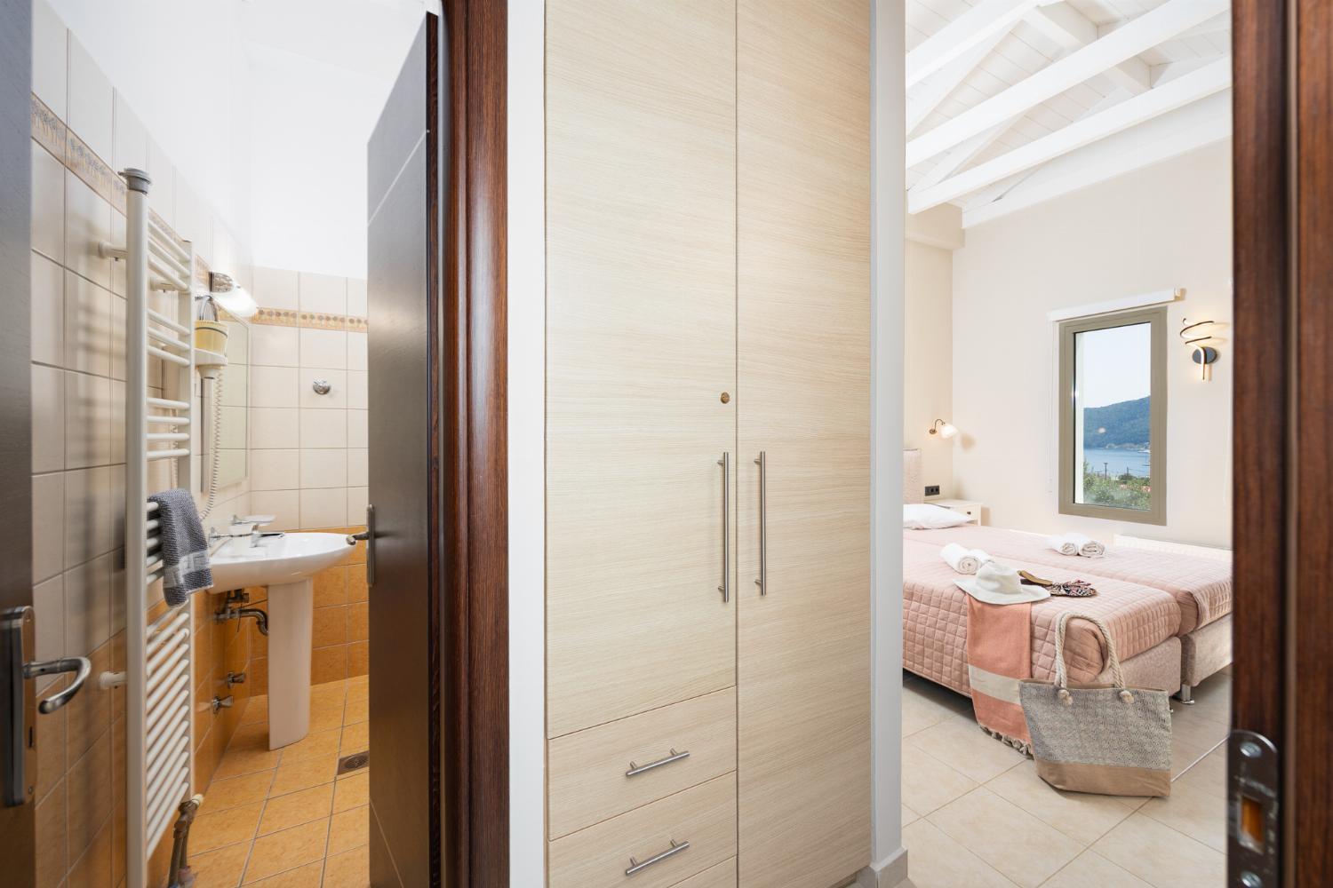 Twin bedroom with en suite bathroom and A/C