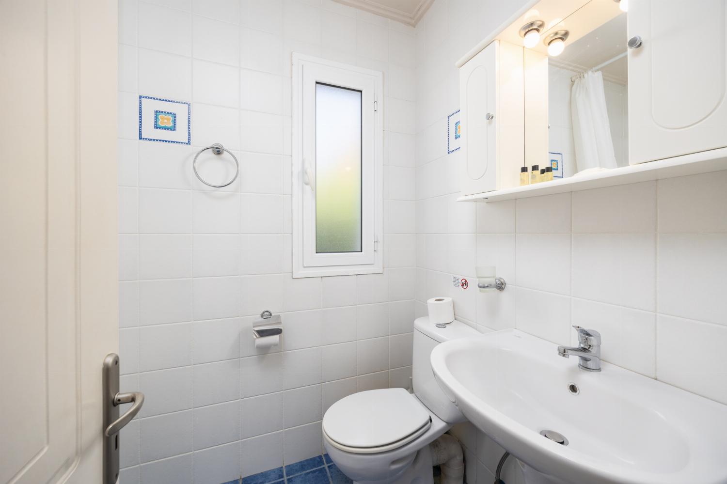 Family bathroom with bath and shower
