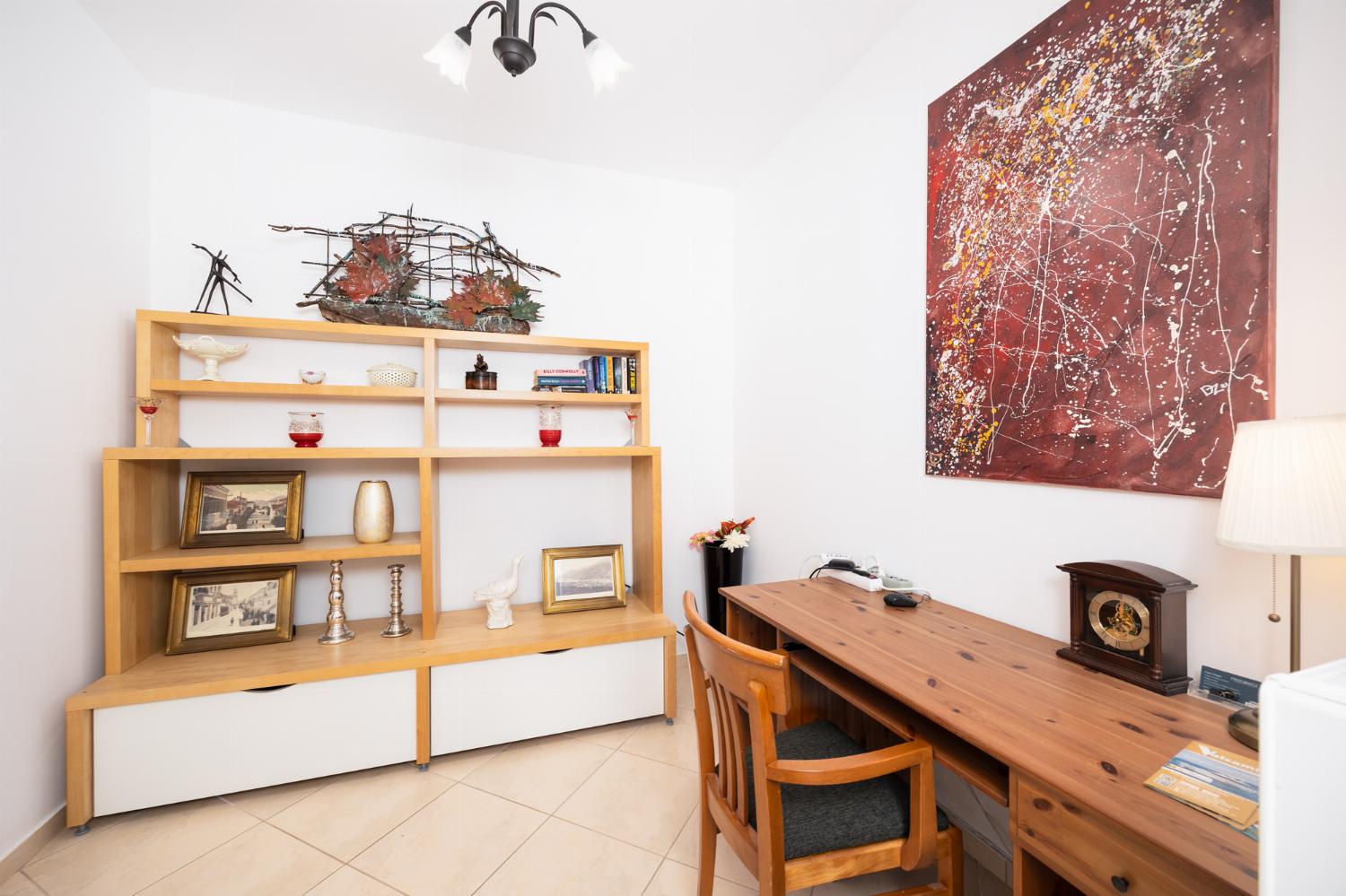 Living room with sofas, dining area, A/C, WiFi internet, and satellite TV