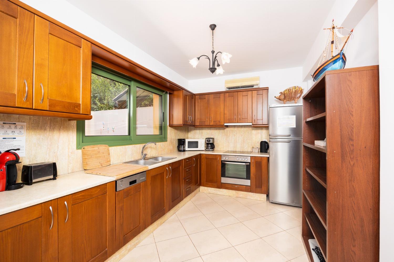 Equipped kitchen with A/C and dining area