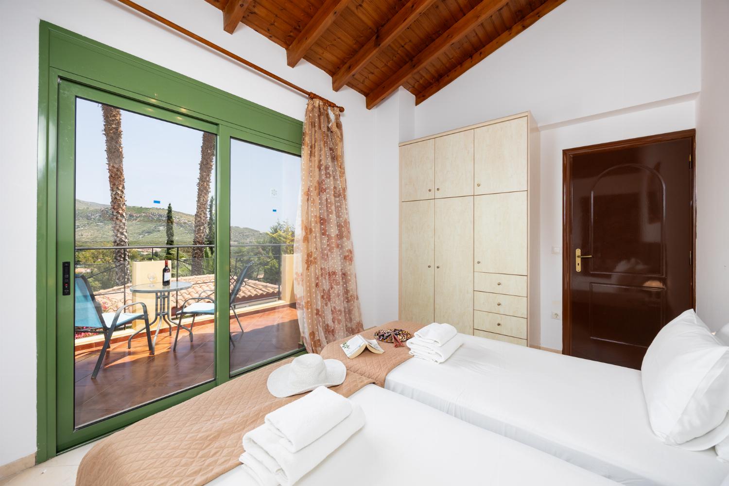 Twin bedroom with en suite bathroom and A/C