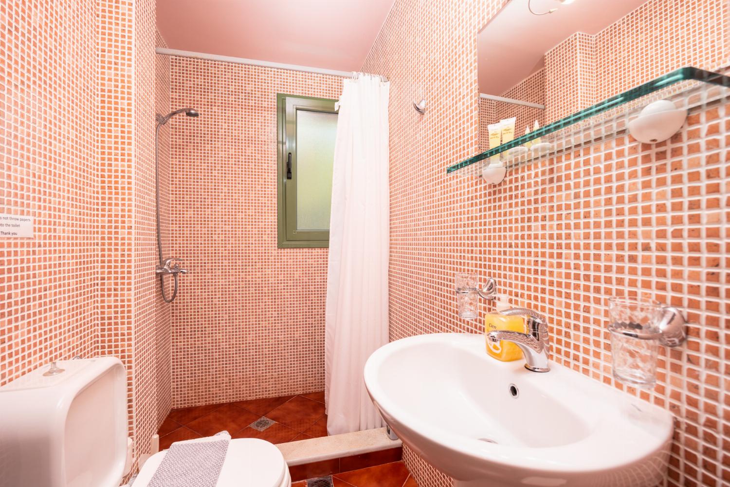 En suite bathroom with shower