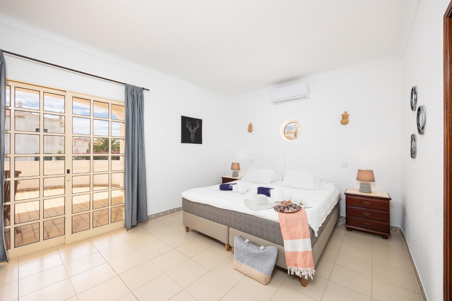 Double bedroom with en suite bathroom and A/C
