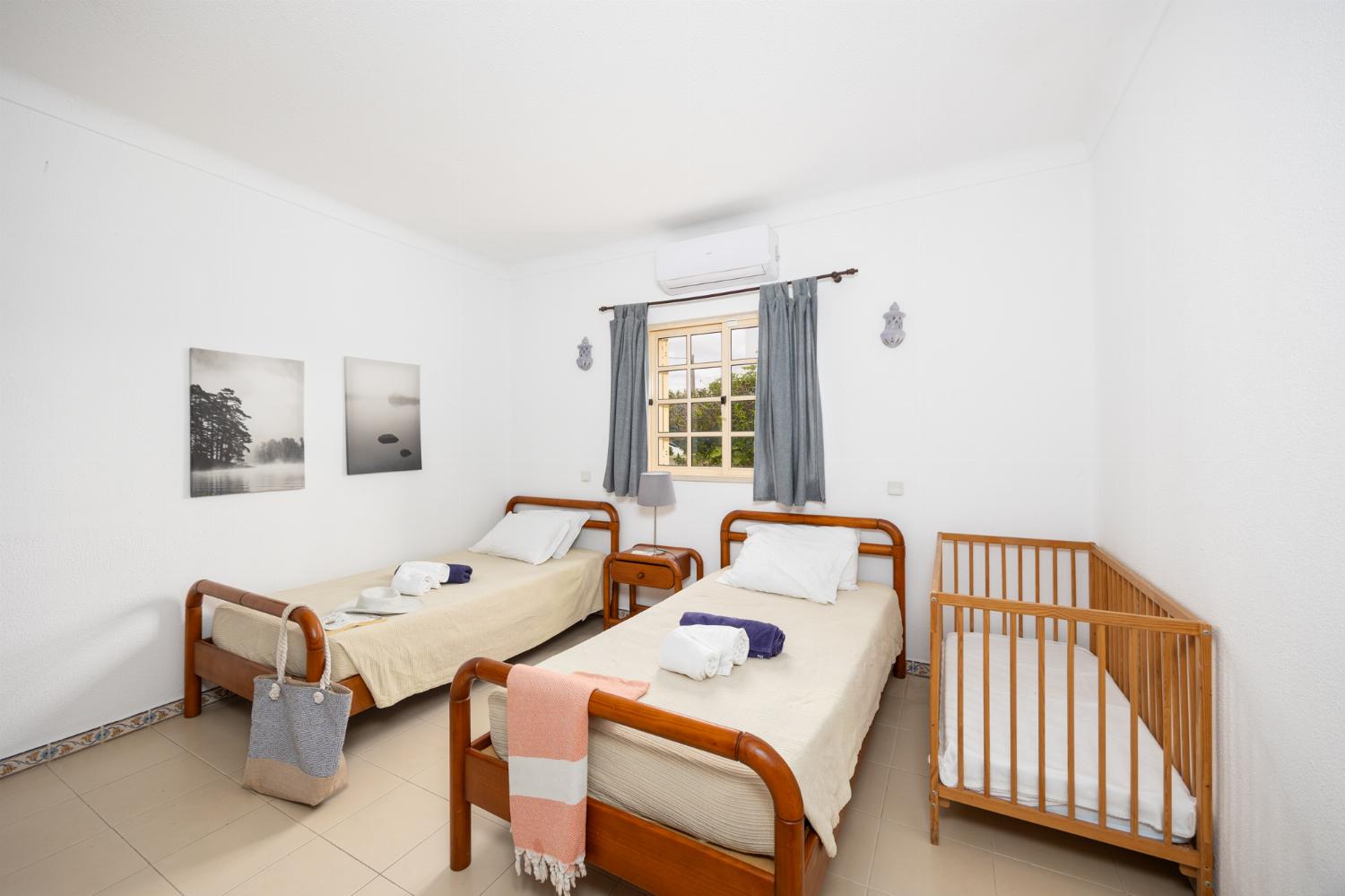 Twin bedroom with A/C