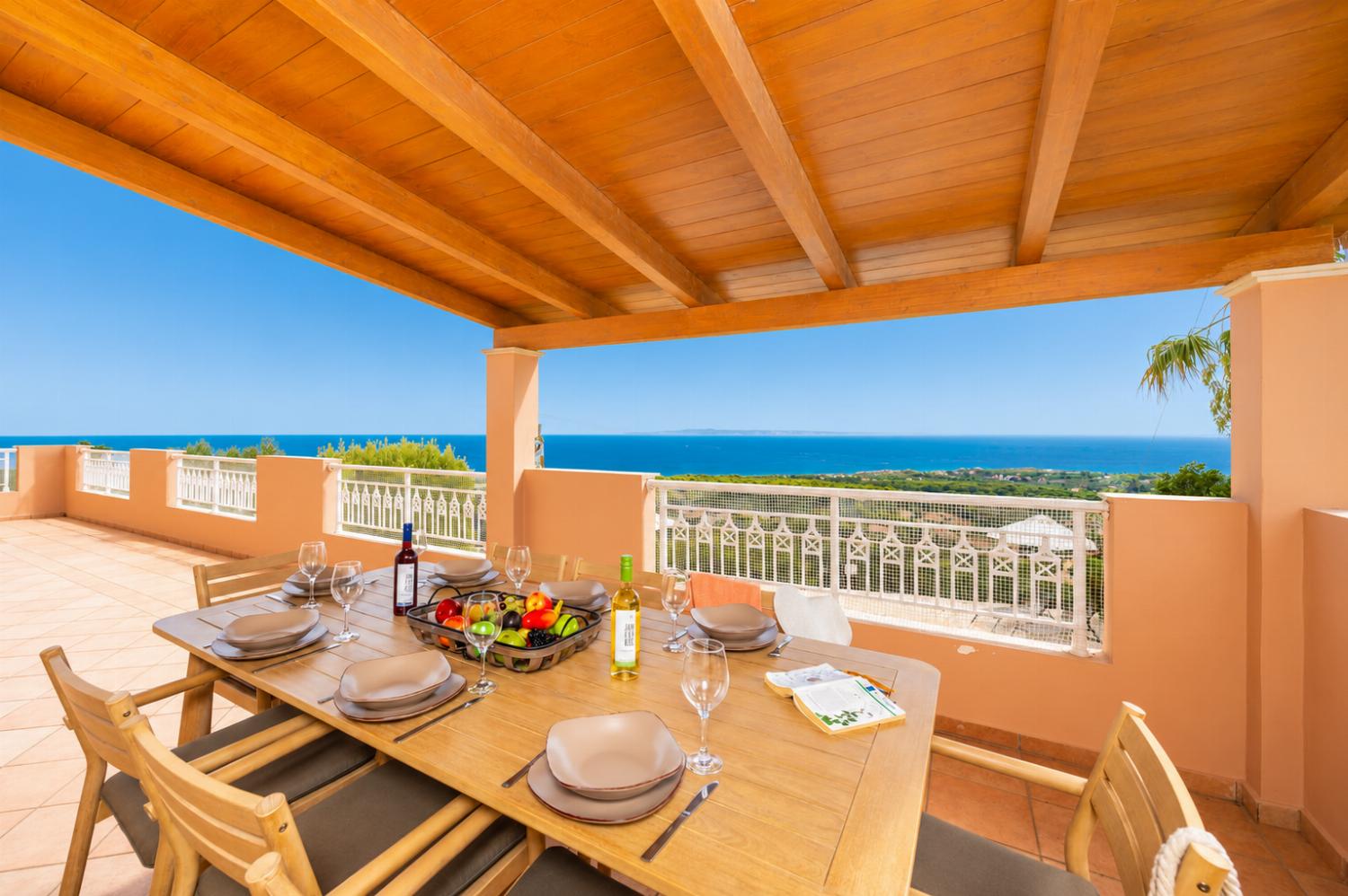 Sheltered terrace area with sea views