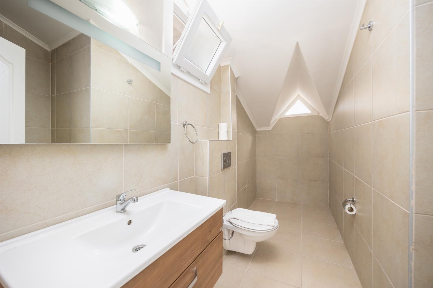 En suite bathroom with shower