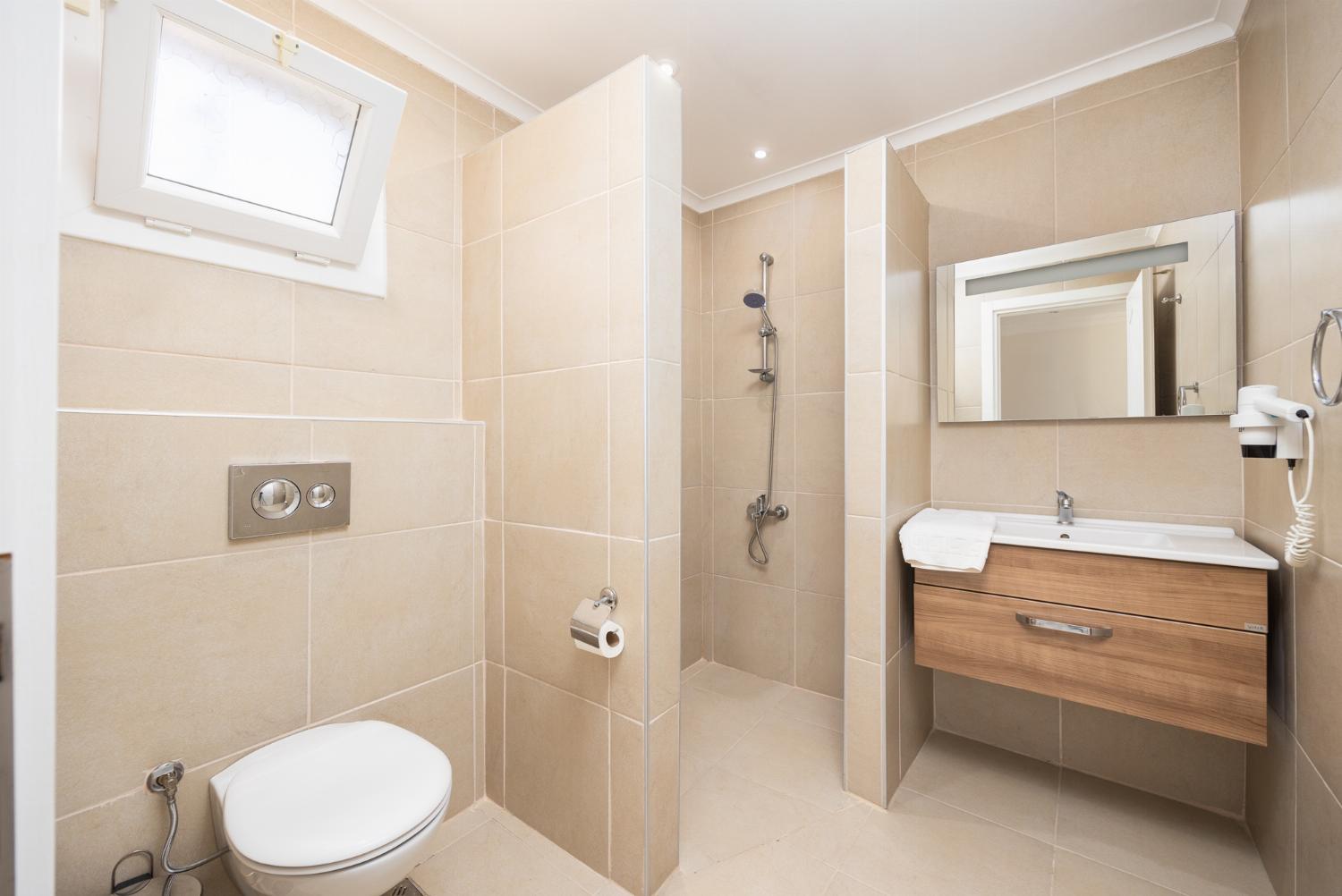 En suite bathroom with shower