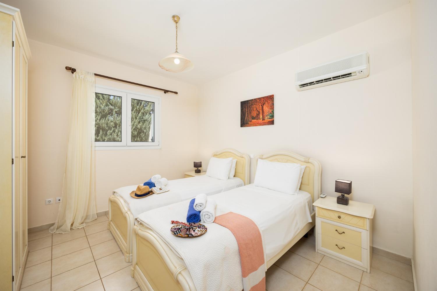 Twin bedroom with A/C