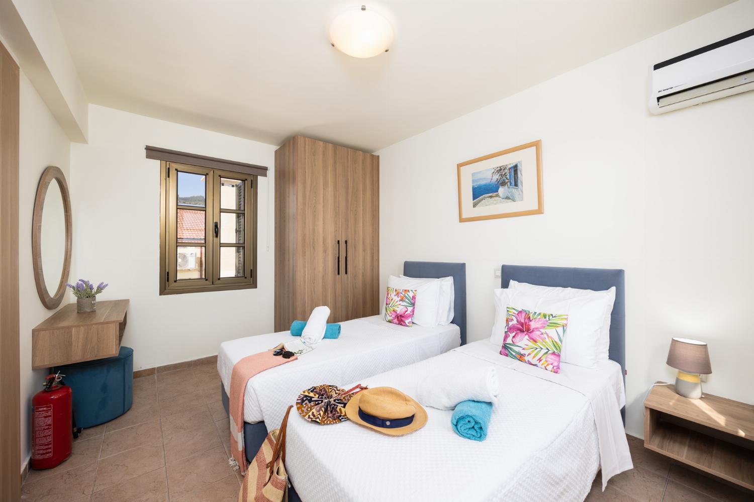 Twin bedroom with A/C