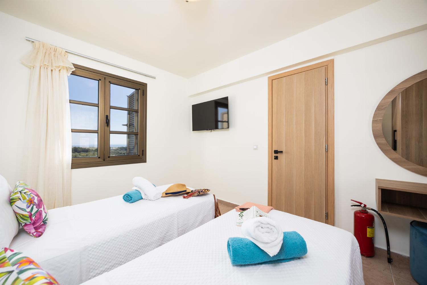 Twin bedroom with A/C