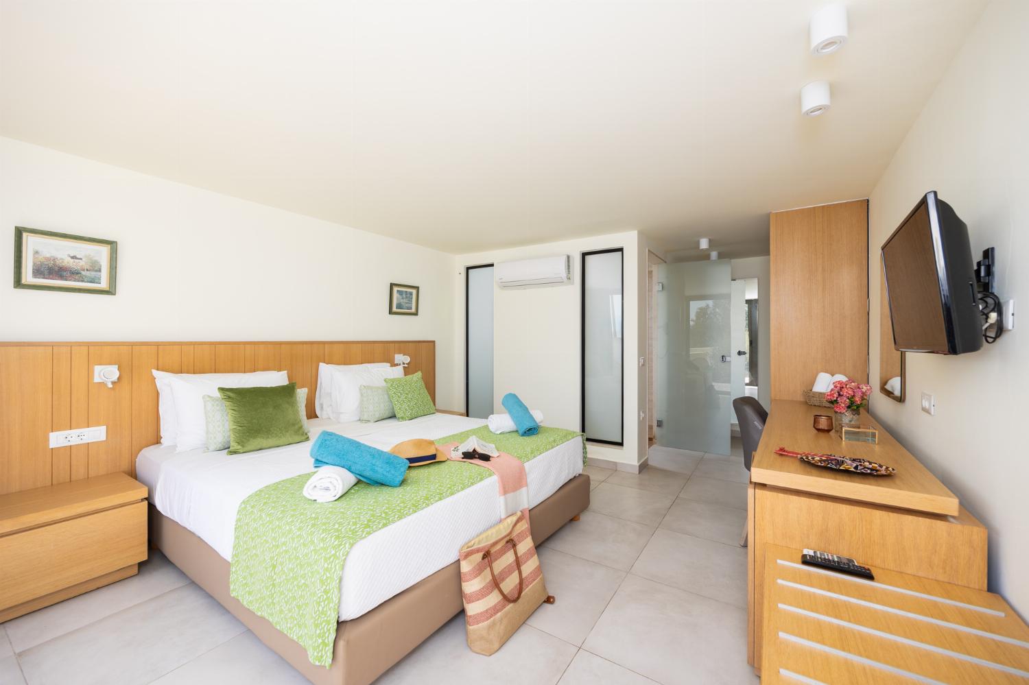 Double bedroom in annex with en suite bathroom and A/C