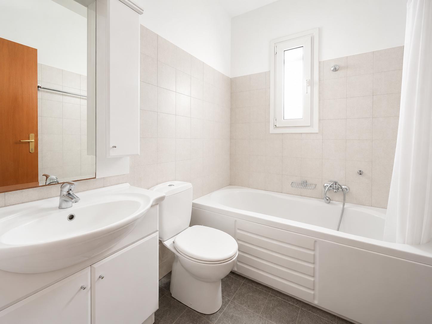 En suite bathroom with bath