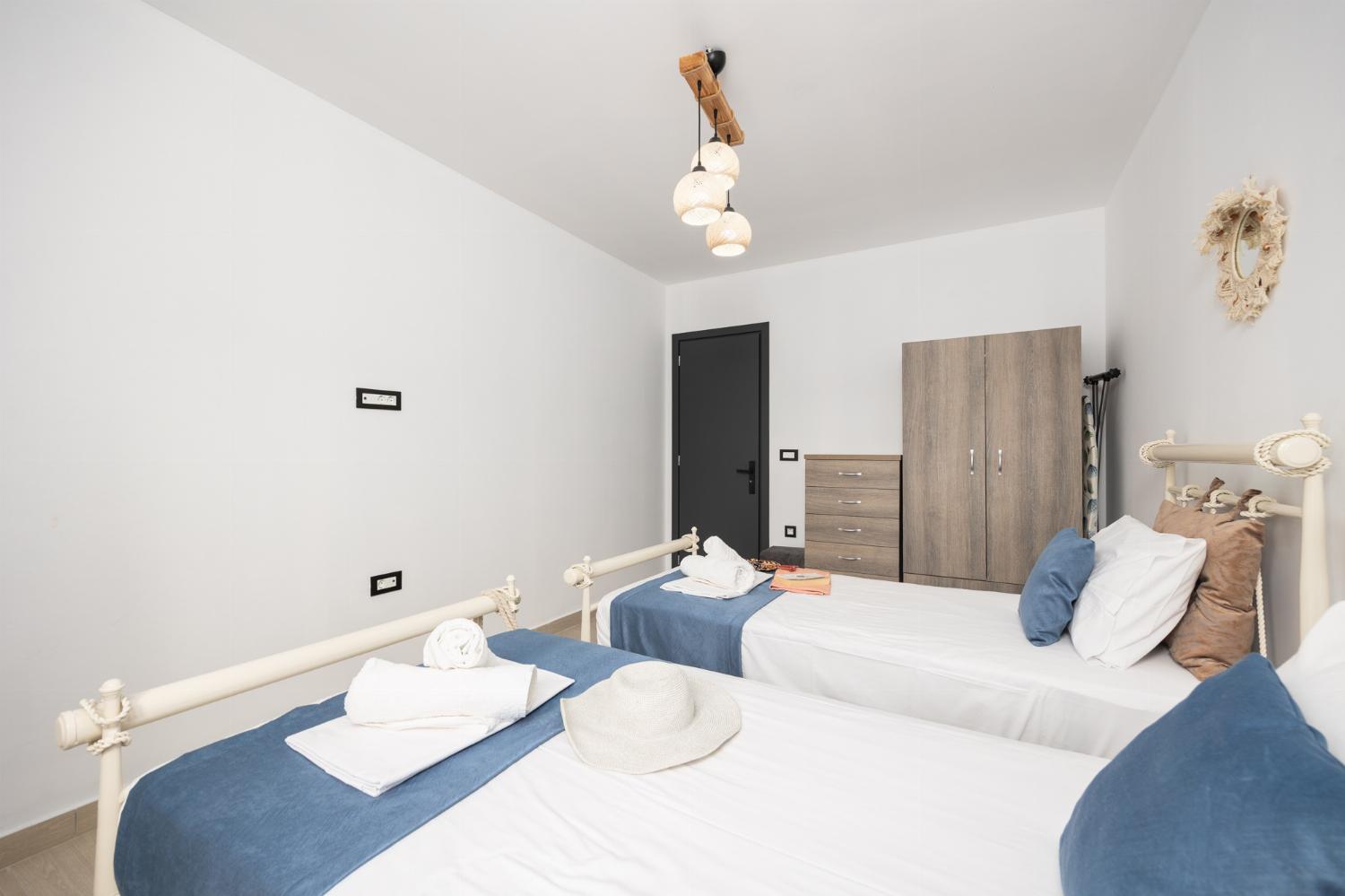 Twin bedroom with A/C