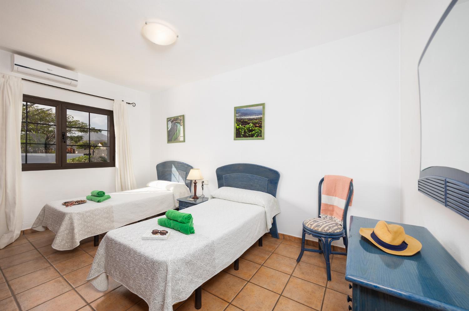 Twin bedroom with A/C
