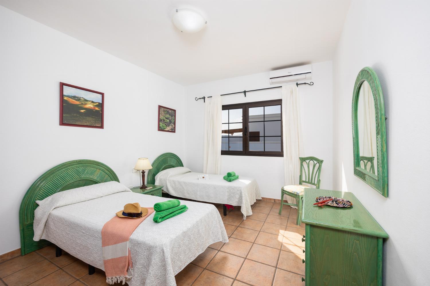 Twin bedroom with A/C