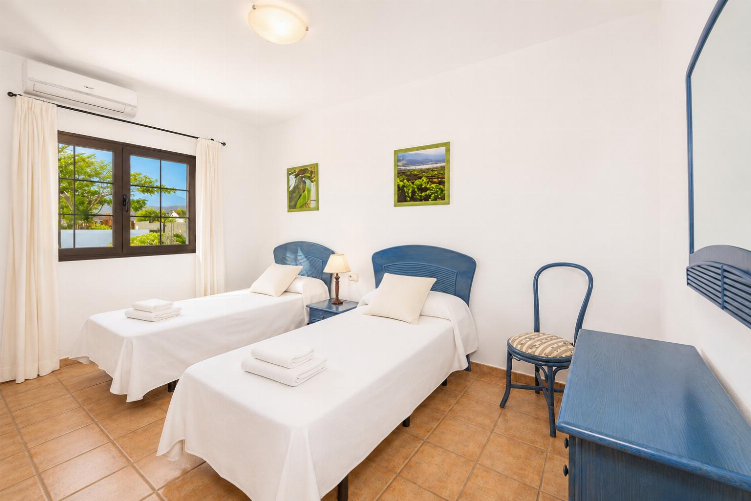 Twin bedroom with A/C