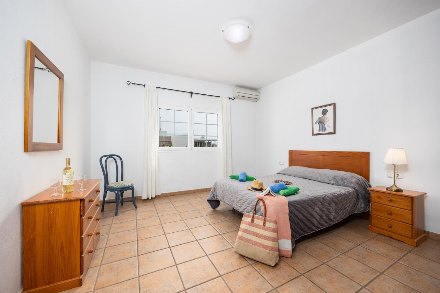 Double bedroom with en suite bathroom and A/C