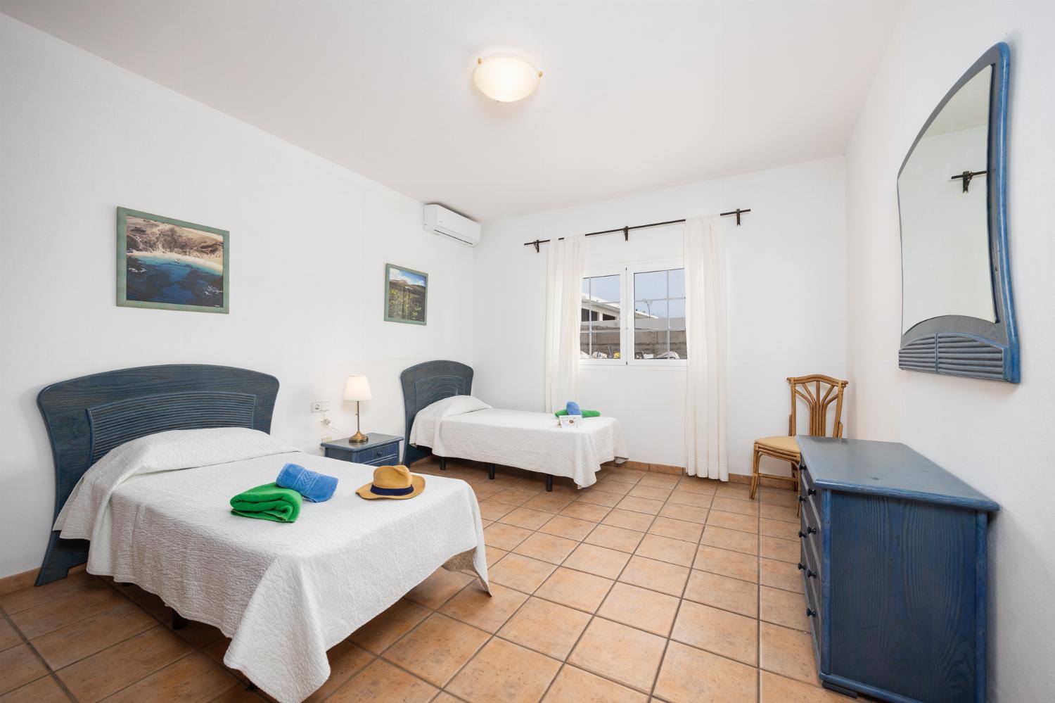Twin bedroom with A/C