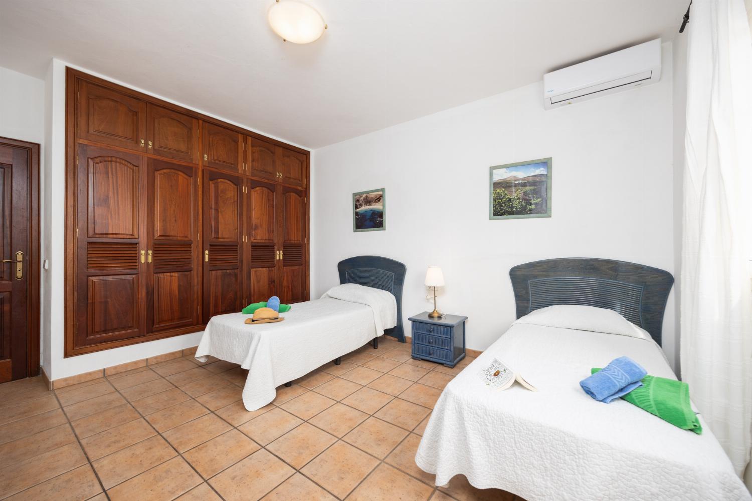 Twin bedroom with A/C