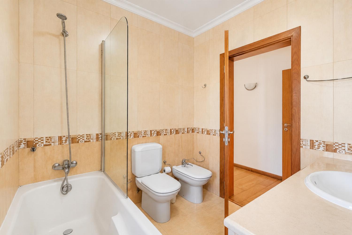 En suite bathroom with bath