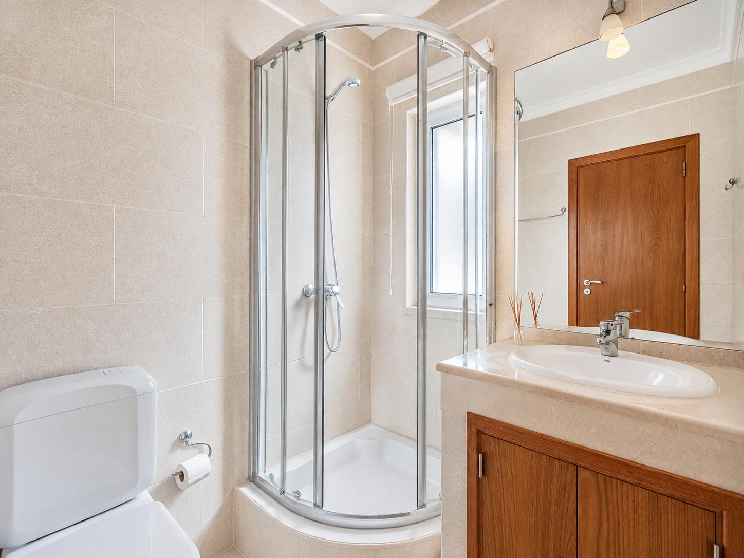 En suite bathroom with shower