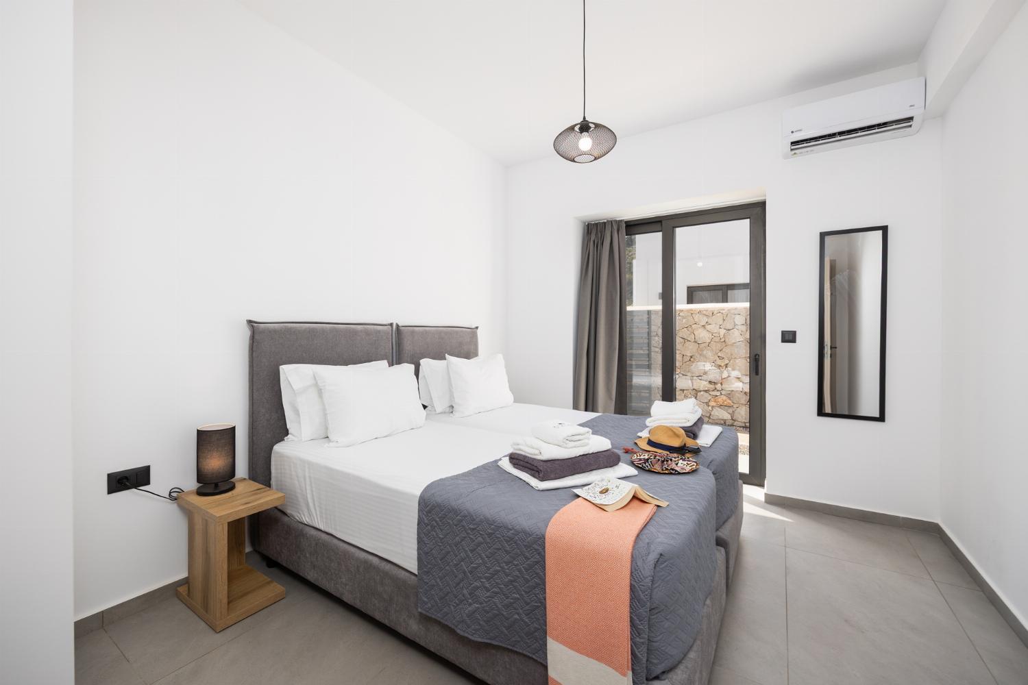 Twin bedroom with A/C