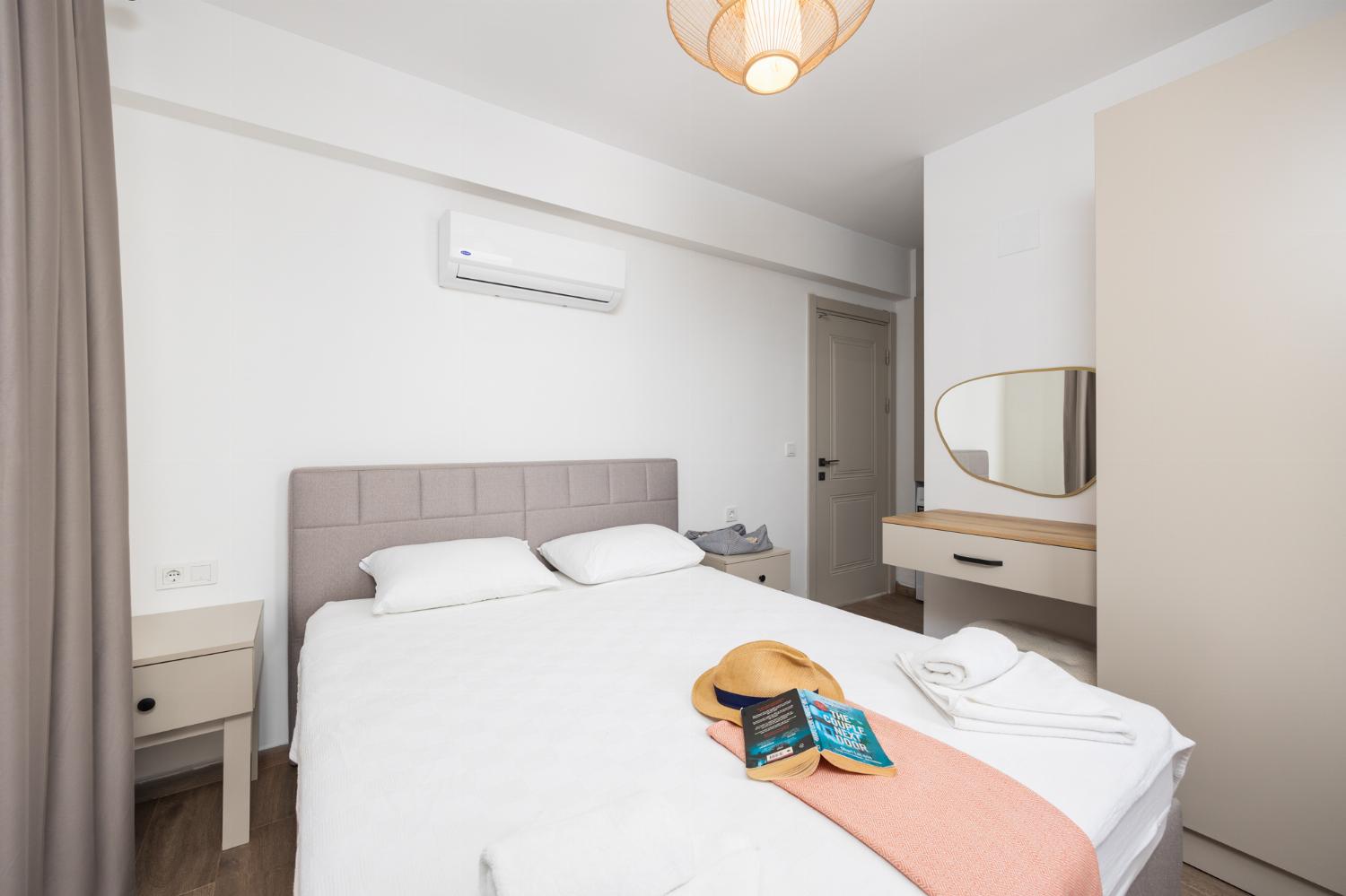 Double bedroom with en suite bathroom and A/C