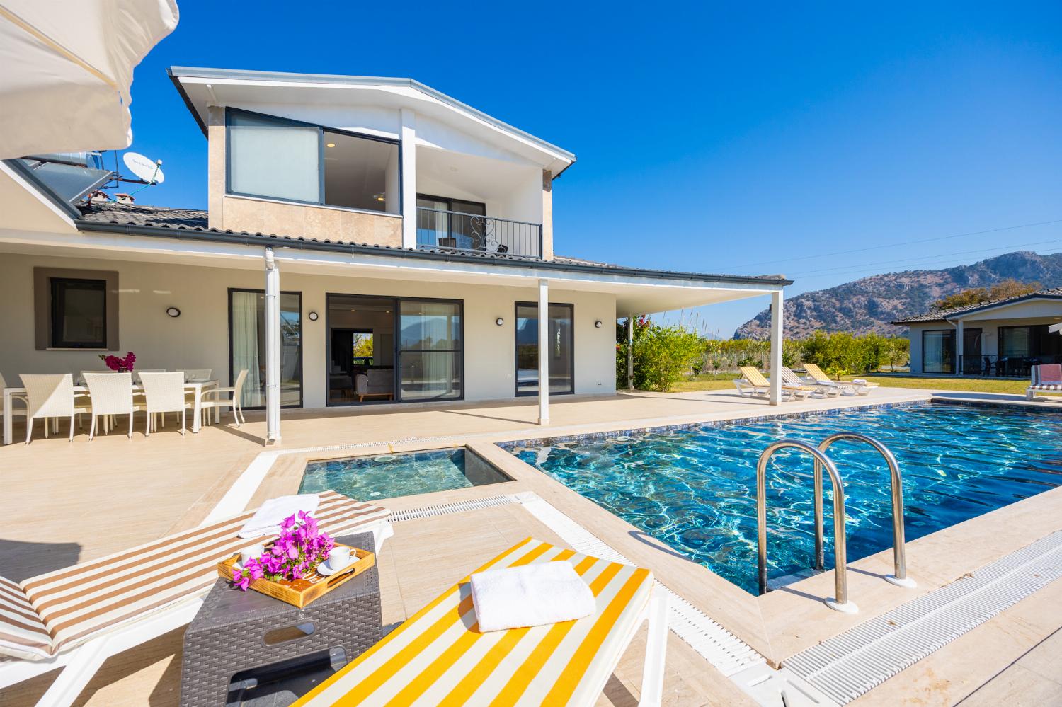 ,Beautiful villa with private pool, terrace, and garden