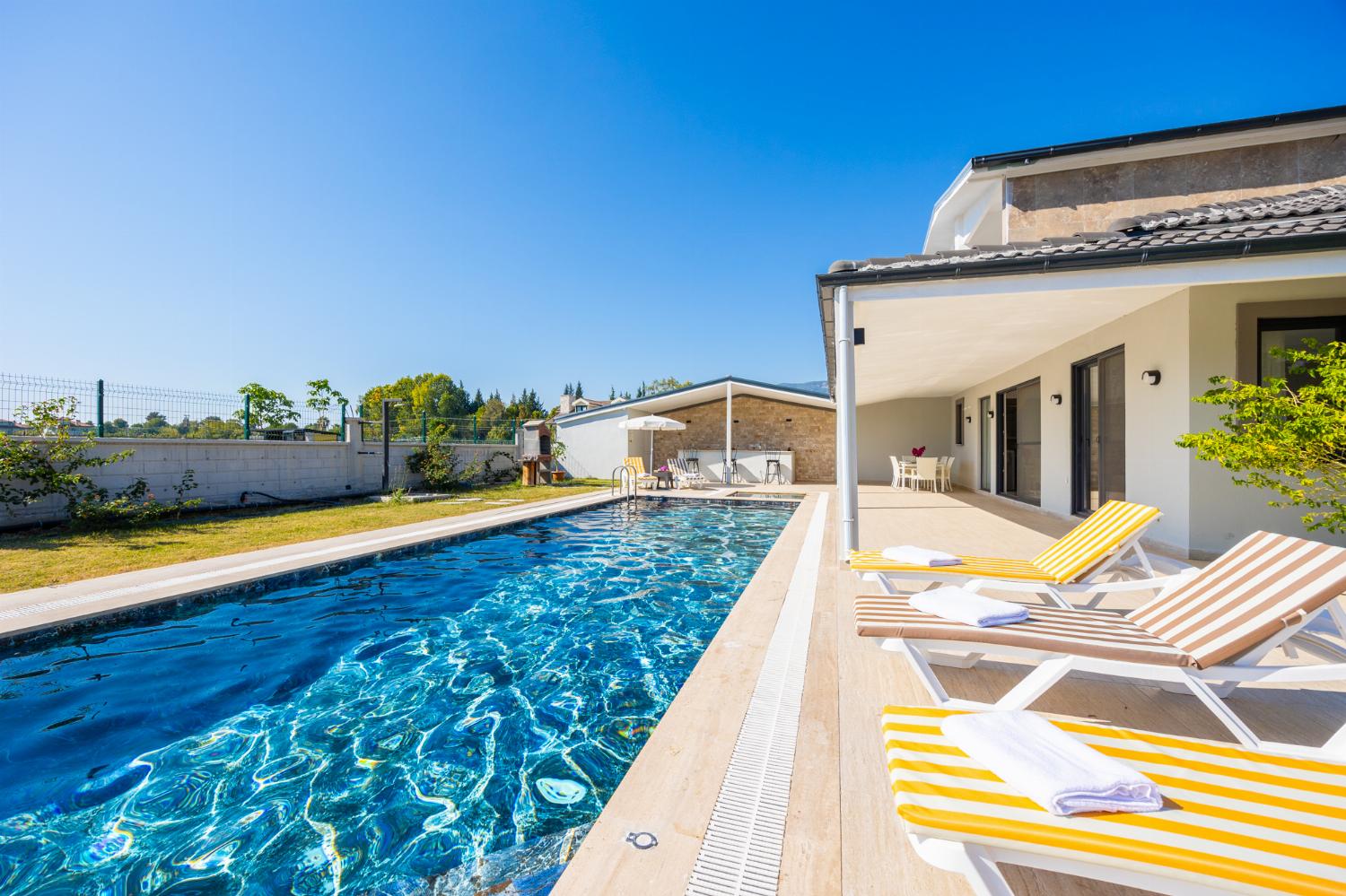 Private pool, terrace, and garden