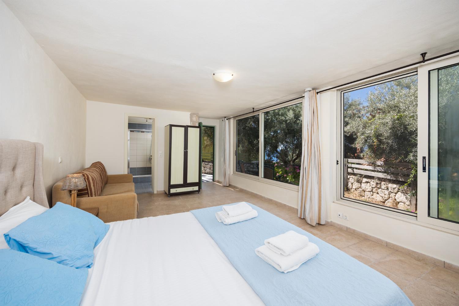 Double bedroom in annex, with en suite bathroom and A/C