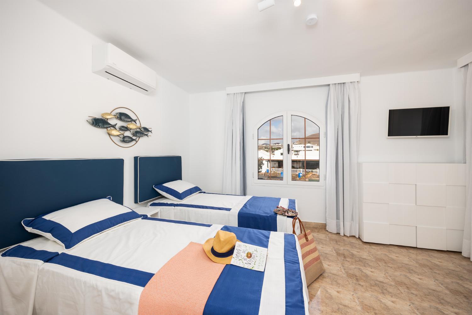 Twin bedroom with A/C