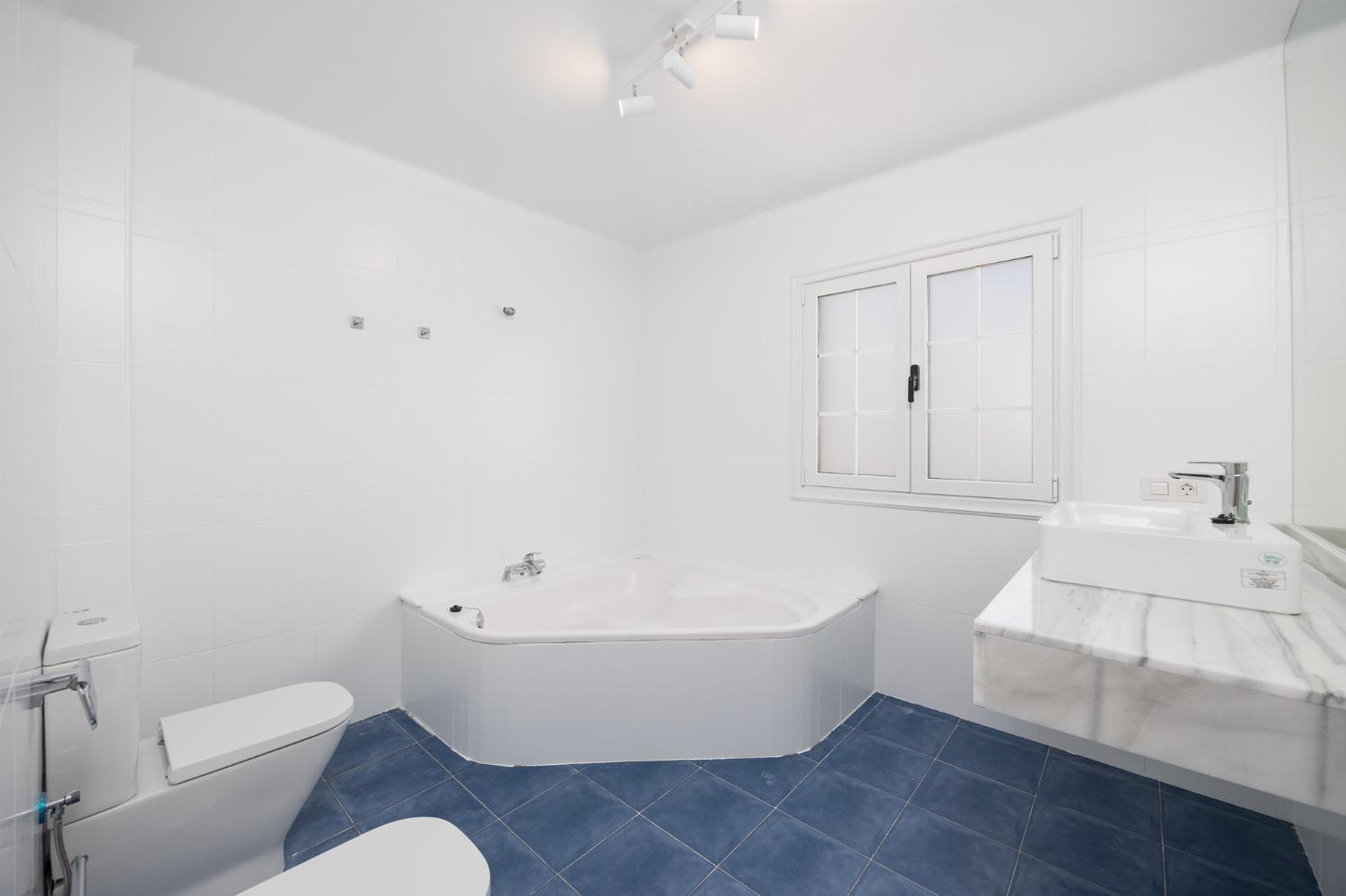 Family bathroom with bath